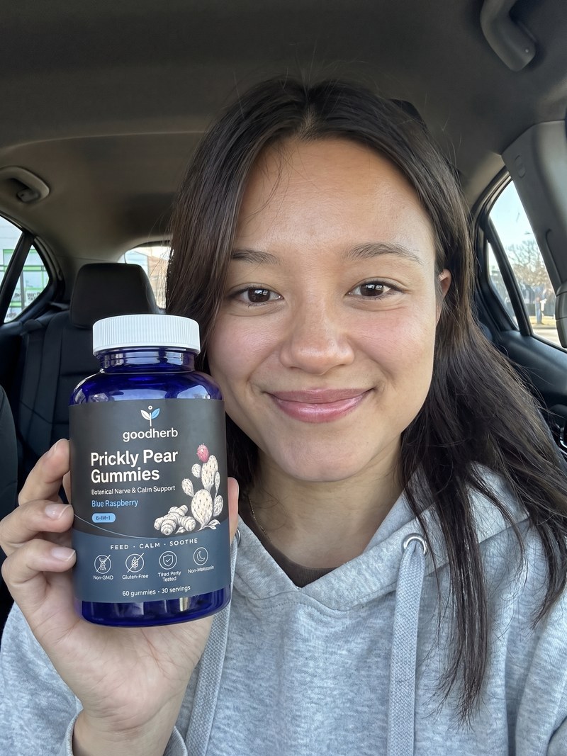 Kayla Z. holding Goodherb Prickly Pear Gummies
